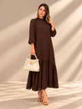 Elena™ | Vestido largo con vuelo y manga abullonada